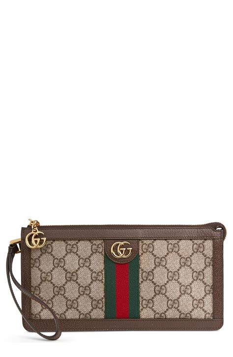 gucci supreme wristlet